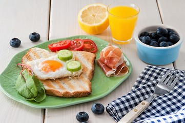 Healthy breakfast, muesli, juices and scrambled eggs
