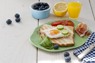 Healthy breakfast, muesli, juices and scrambled eggs