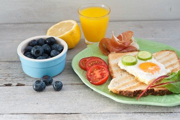 Healthy breakfast, muesli, juices and scrambled eggs