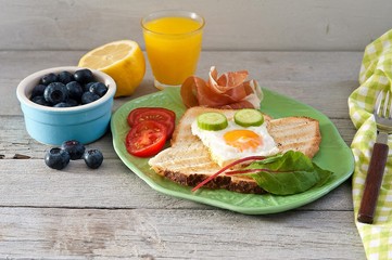 Healthy breakfast, muesli, juices and scrambled eggs