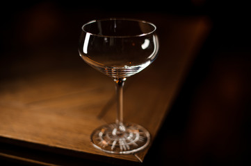 Empty cocktail glass on table