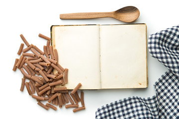 Blank recipe book and italian pasta.