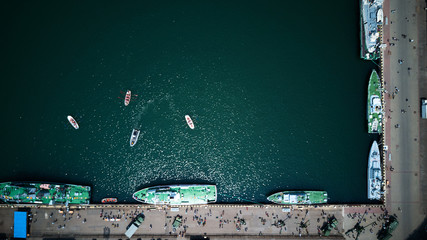 top view of port with parking and warships