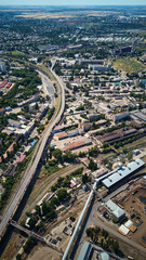 Fototapeta na wymiar aerial view of odessa city with industrial district railroad and highway