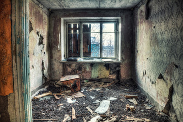 Abandoned house.Room with a window in an old building