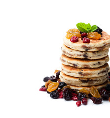 Stack  of welsh cakes with dry berries isolated on white
