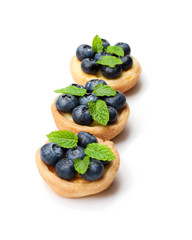 puff  pastry stuffed with soft curd with blueberries on white background