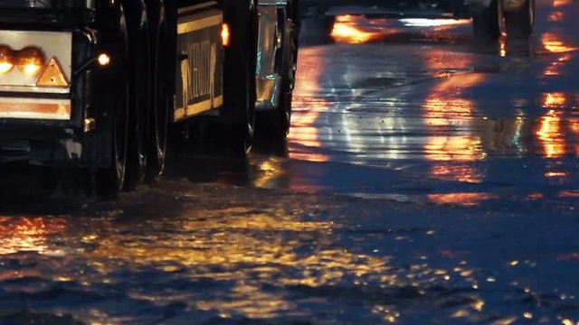 Flooding in city streets at night