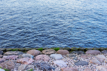 Fototapeta na wymiar water bordering with stone