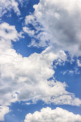 Obraz premium Beautiful blue sky with big white clouds