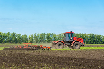 Obraz premium Tractor on the field