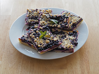 home made blueberry cake or pie on  white plate
