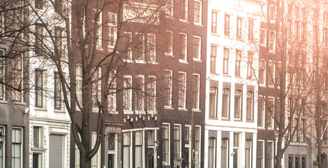 Amsterdam streets. View of narrow residential houses in historical city centre of Amsterdam, Netherlands.