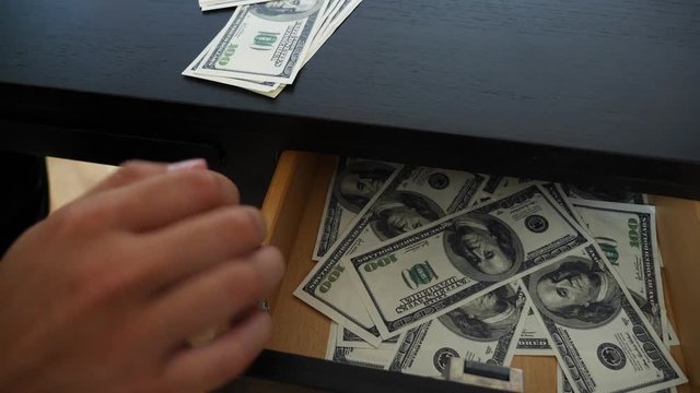 corruption, bribery and fraud concept - close up of businessman taking money. 4k, slow motion