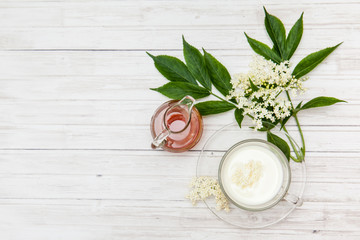 Elderflower (Sambucus nigra), milk and honey infusion for cough treatment