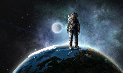 Astronaut explorer in space. Mixed media