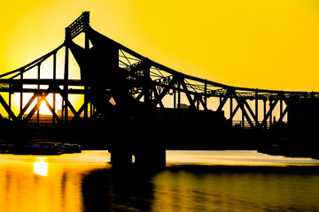 side view of steel bridge against sunset,tianjin,china.