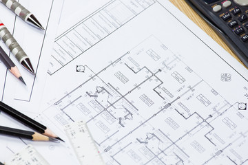 Abstract engineering drawings background with blank for your word. Construction plan tools with empty space on desk.