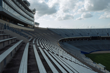 Clouds over an empty stadium on a summer day