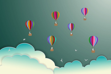 Naklejka premium Colorful hot air balloons floating on the sky,paper art style