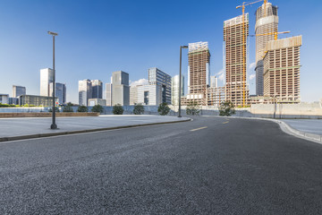 Empty floor with modern city skyline