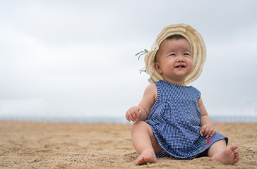 asian baby on the beach
- 165869810
