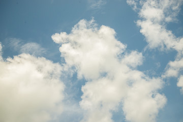 Fantastic soft white clouds against blue sky background