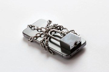 Smartphone with chain locked on white background, security and piracy network concept .