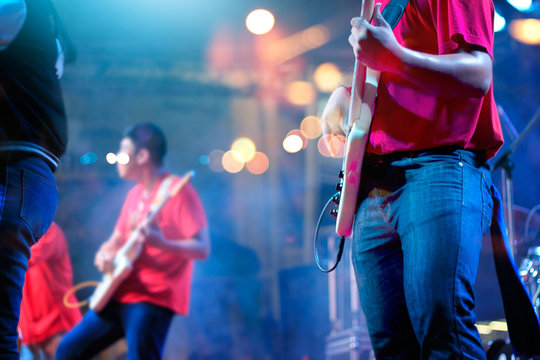 Guitarists on stage for background, soft focus and blur concept