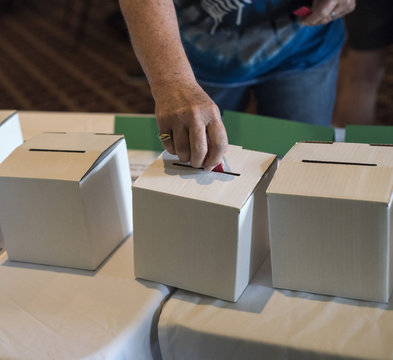 Putting a Raffle Ticket in the Box