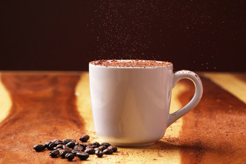 hot coffee on wood floor , mocha