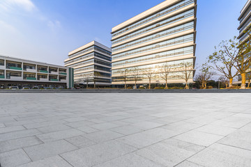 Fototapeta na wymiar Empty floor with modern business office building 