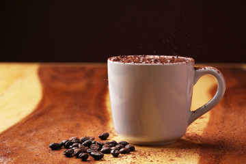 hot coffee on wood floor , mocha