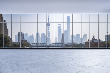 Fototapeta premium Panoramic skyline and buildings from glass window