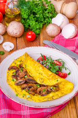 Omelette with fried mushrooms and herbs