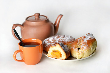 Home baked cakes and hot tea.