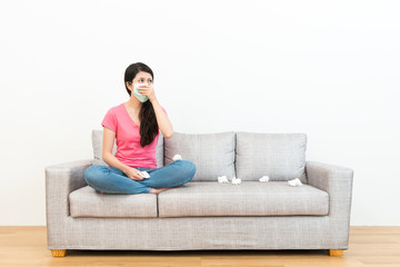 elegant lovely woman sitting on sofa couch