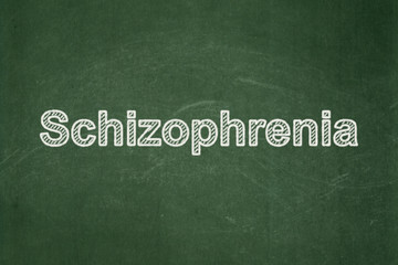 Obraz premium Medicine concept: Schizophrenia on chalkboard background