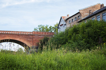 Fototapeta na wymiar (the River) Venta at Latvia.Kuldiga. beautiful old bridge