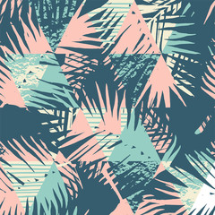 Fototapeta premium Seamless exotic pattern with tropical palm leaves on geometric background.
