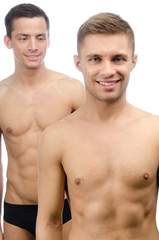 Fototapeta na wymiar Summer, vacation. Two sexy guys. Love and relationships. White background. 