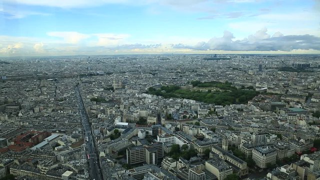 Tour Montparnasse time lapse in Paris skyline with Luxembourg Palace and gardens. Saint-Sulpice church panoramic view. French capital in Europe on Rue Rennes street.