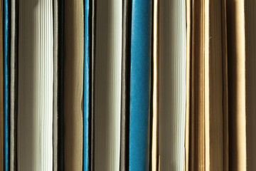 Books close up on old wooden table