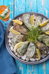 raw oysters with lemon and ice
