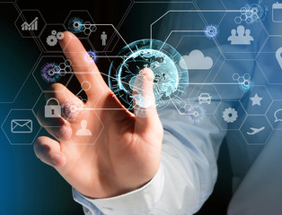 International business network connection displayed on a futuristic interface with technology icon and sphere globe - Worldwide business concept