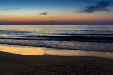 Fototapeta na wymiar Beautiful sunrise at the Black Sea in Mamaia, Romania