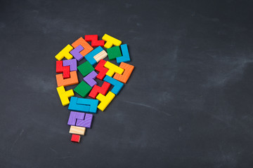 Business creative solution concept jigsaw on the blackboard