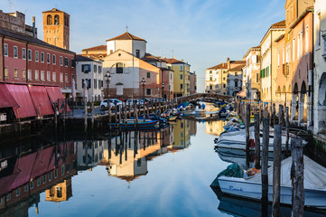 Fototapeta na wymiar The canals and the old town in Chioggia, Italy