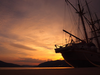 silhouette of the ship in sunset