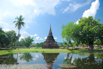 Sunny day at Sukhothai Historical Park, World heritage site. One of the most famous places in Thailand.